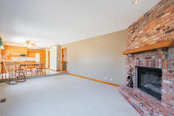 a view of workspace with furniture and a book shelf