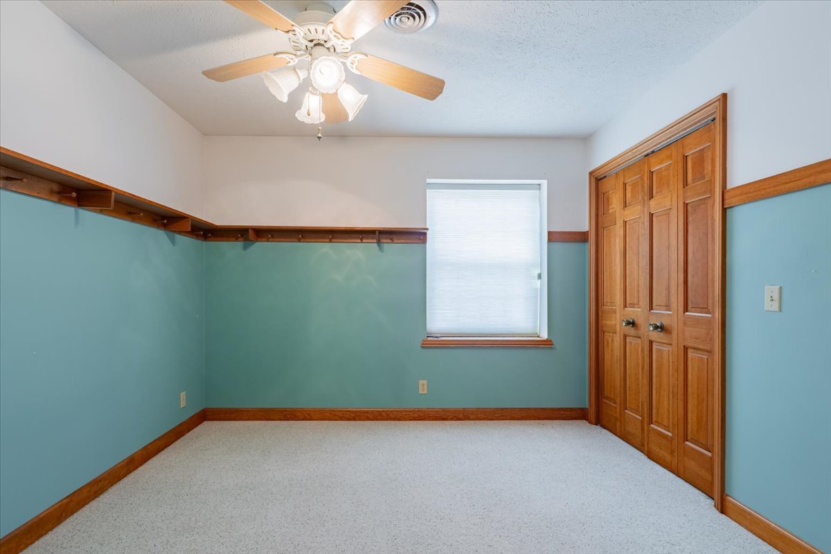 21389 North 2875 East Road Lexington, IL 61753 - Photo 34 of 44 a view of an empty room with window and chandelier fan