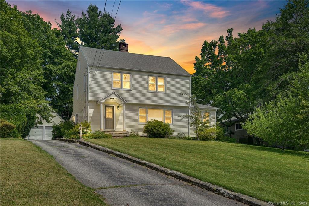 302 Booth Hill Road Trumbull, CT 06611 - Photo 1 of 1 a front view of a house with a yard