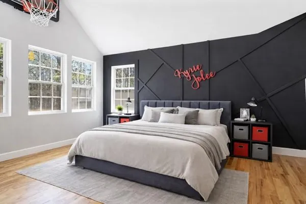 a bathroom with a toilet a sink and a mirror