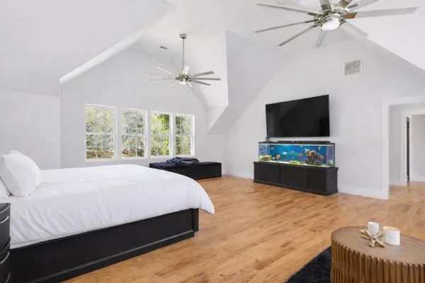 a living room with furniture and a bathtub