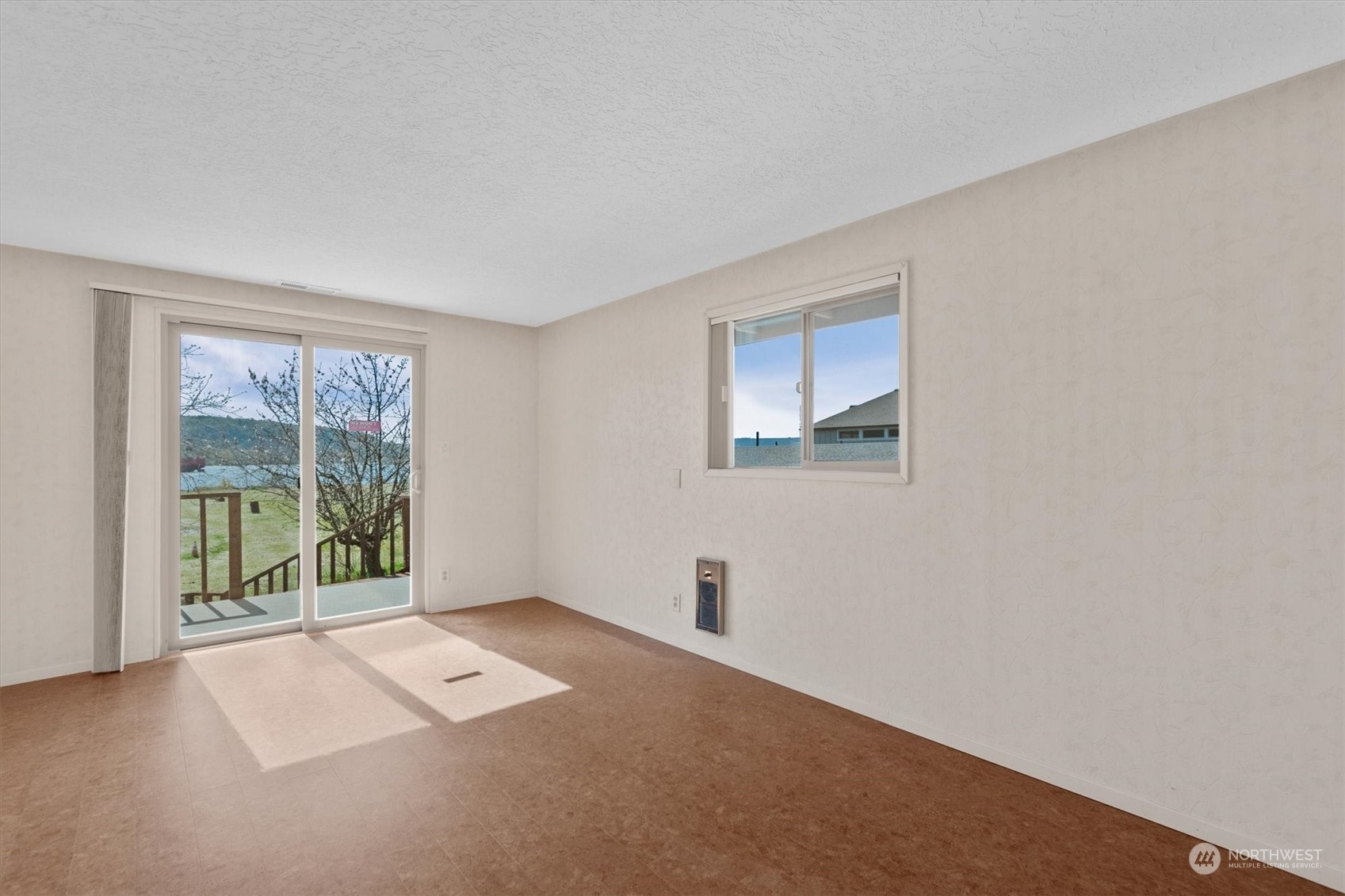 7405 Willow Grove Road Longview, WA 98632 - Photo 26 of 39 a view of an empty room with glass door