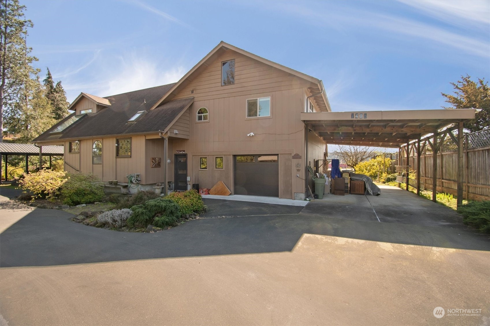 7405 Willow Grove Road Longview, WA 98632 - Photo 3 of 39 a front view of a house with a yard and outdoor seating
