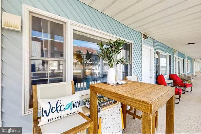 a view of dinning table and chairs in the patio