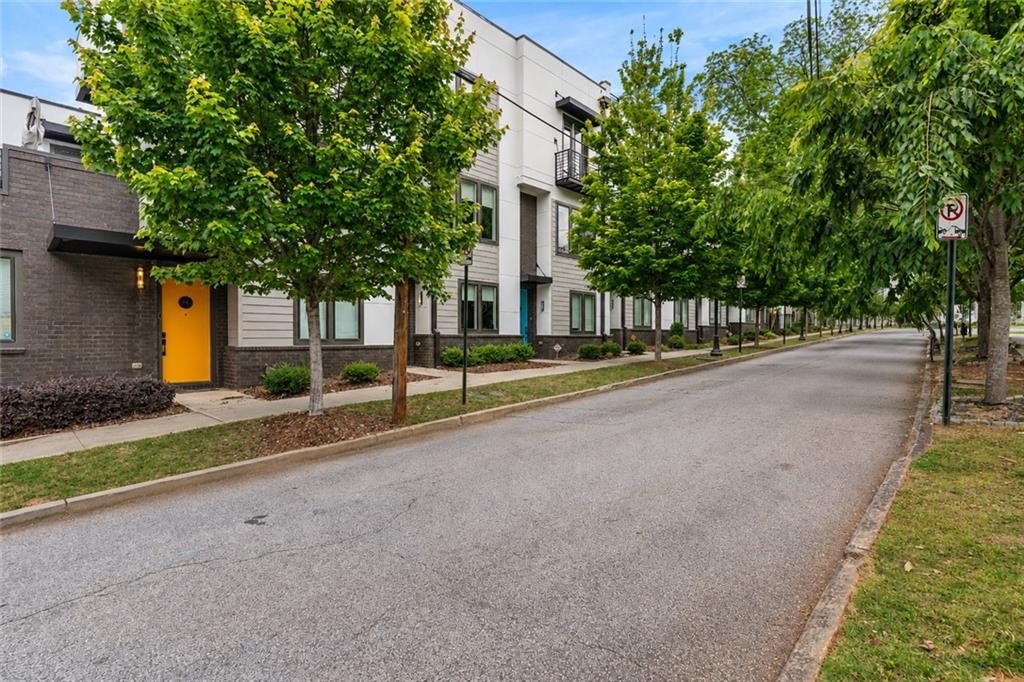 415 Gartrell Street Southeast, Unit 16 Atlanta, GA 30312 - Photo 1 of 29 a view of a road with brick building in the background