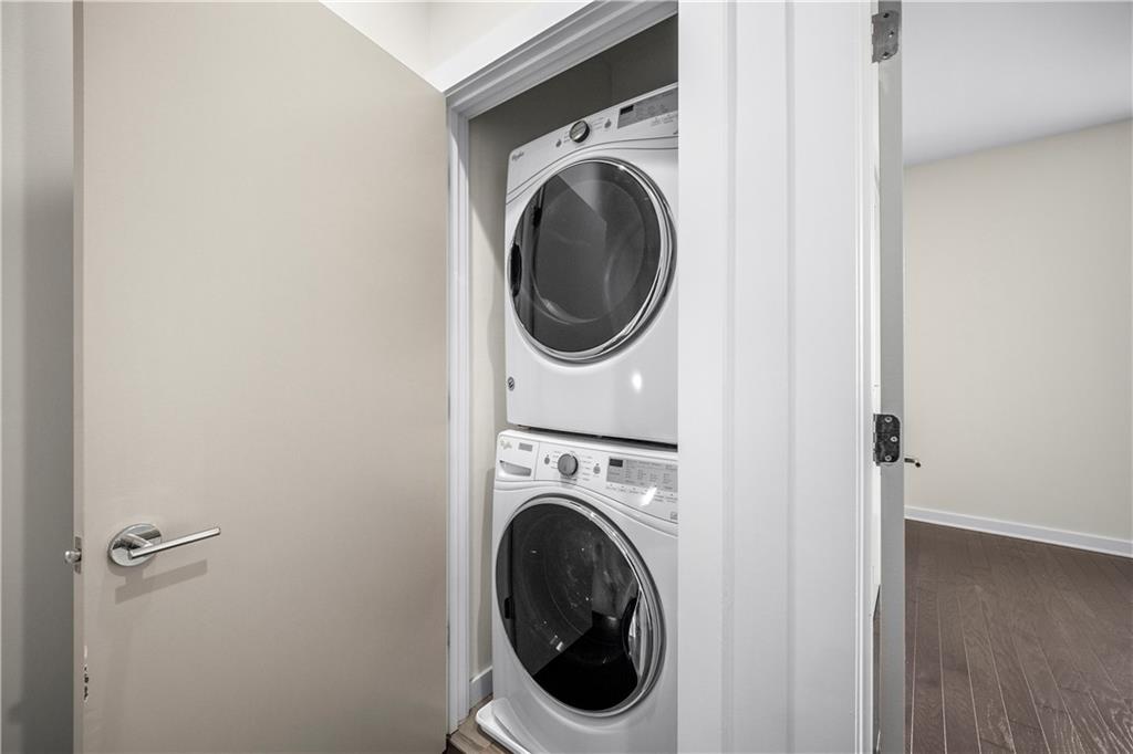 415 Gartrell Street Southeast, Unit 16 Atlanta, GA 30312 - Photo 22 of 29 a close view of a utility room with dryer and washer