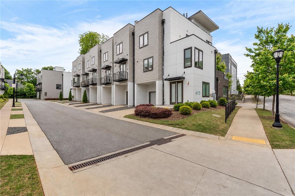 415 Gartrell Street Southeast, Unit 16 Atlanta, GA 30312 - Photo 27 of 29 front view of a house with a yard