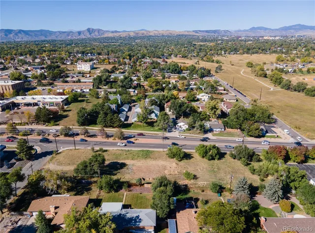 a view of a city with mountains in the background