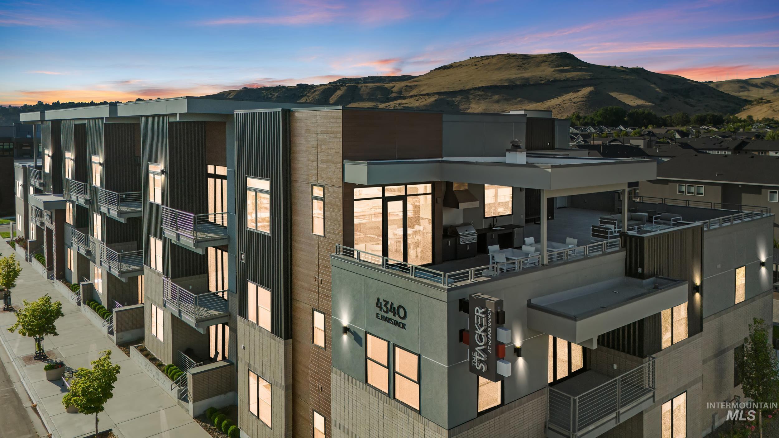 4340 East Haystack Street, Unit 102 Boise, ID 83716 - Photo 32 of 50 Property at dusk featuring a mountain view and a residential view