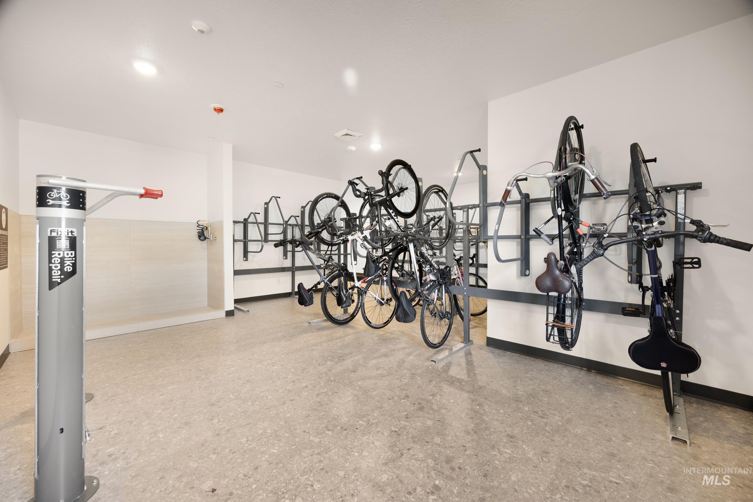 4340 East Haystack Street, Unit 102 Boise, ID 83716 - Photo 41 of 50 Garage featuring baseboards and bike storage