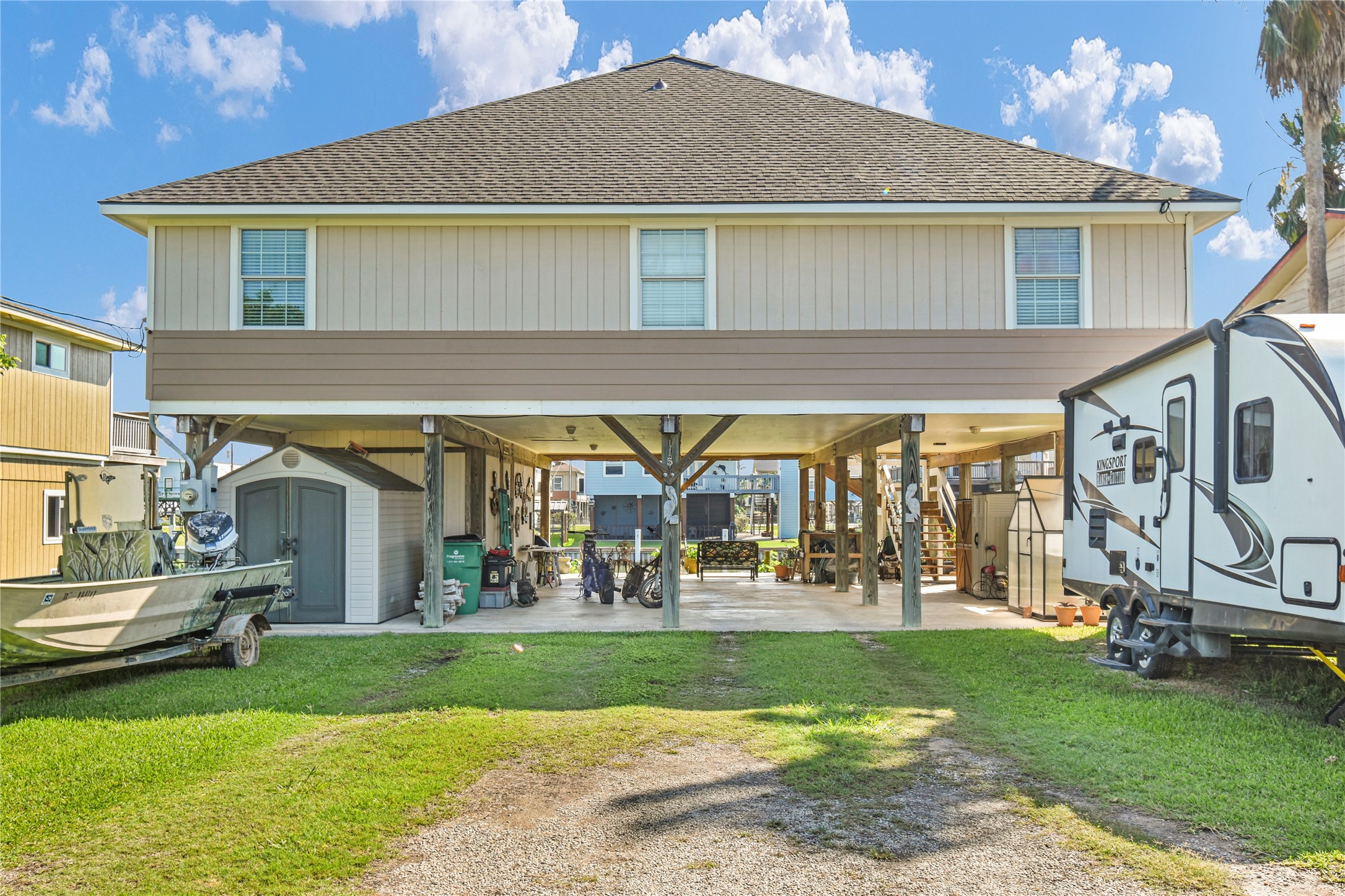 115 Driftwood Road Freeport, TX 77541 - Photo 2 of 21 a view of a house with a yard