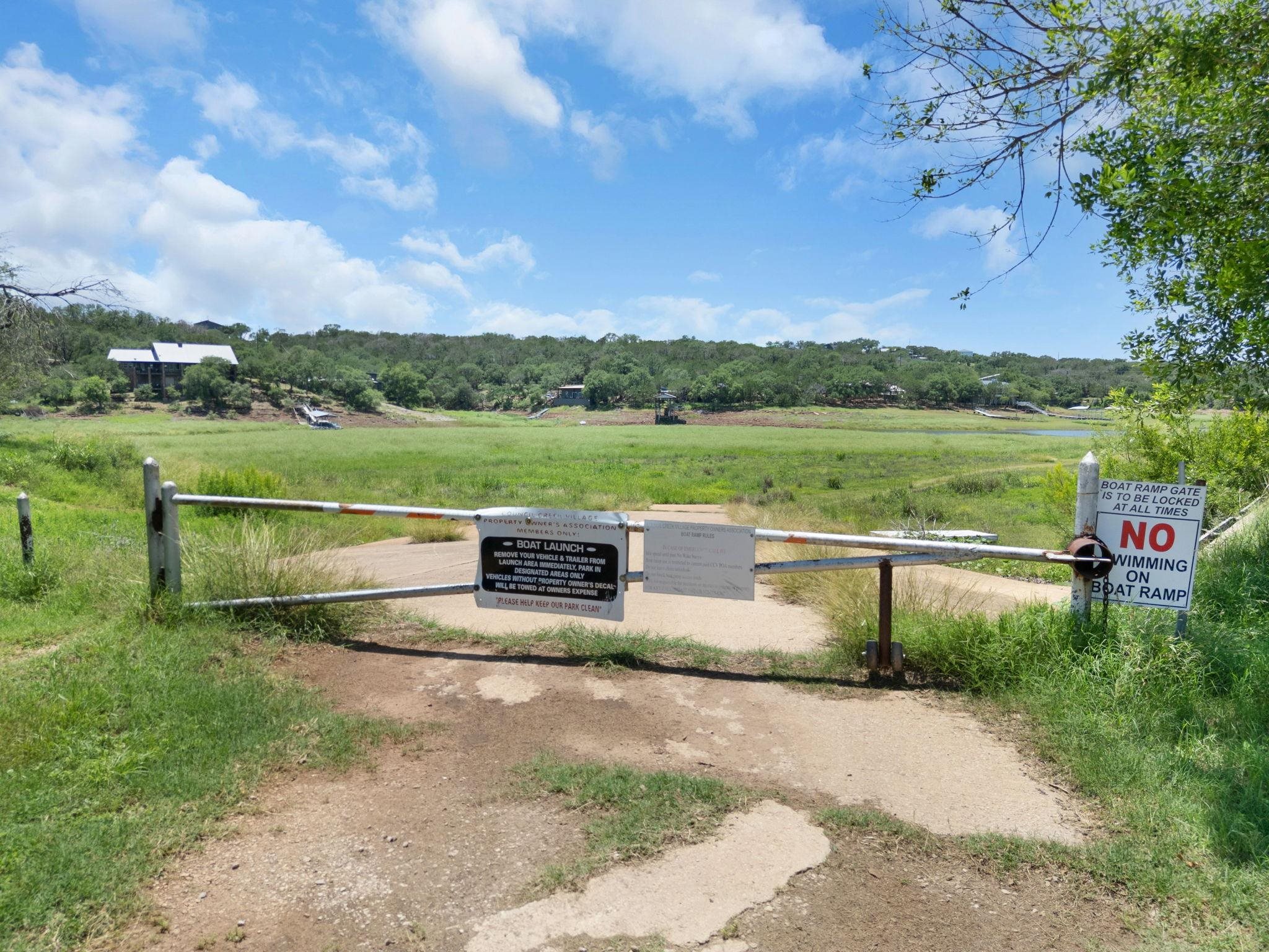 Tbd Spring Street Burnet, TX 78611 - Photo 12 of 12 a view of a lake with a yard