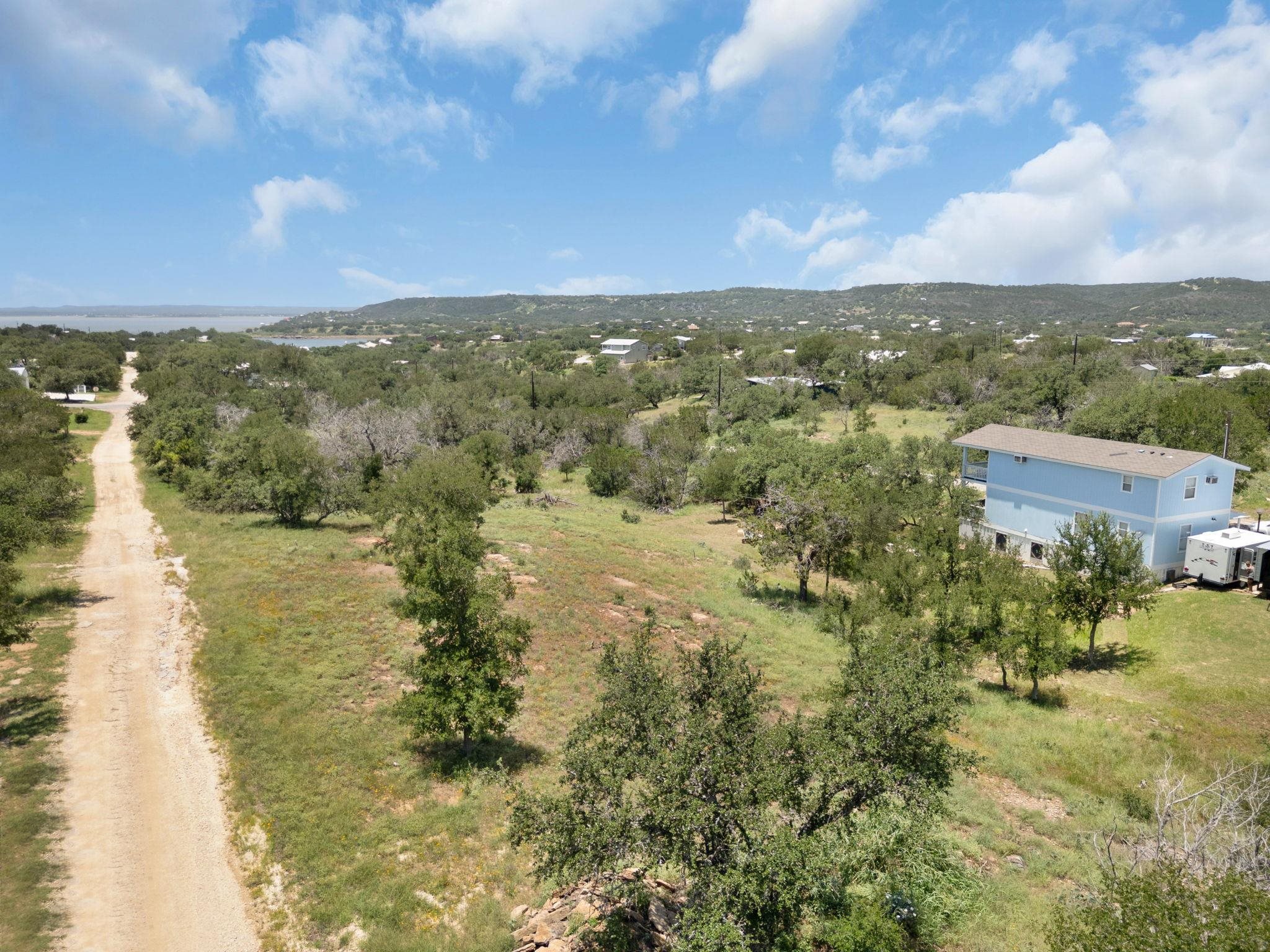 Tbd Spring Street Burnet, TX 78611 - Photo 3 of 12 a view of lake with city view