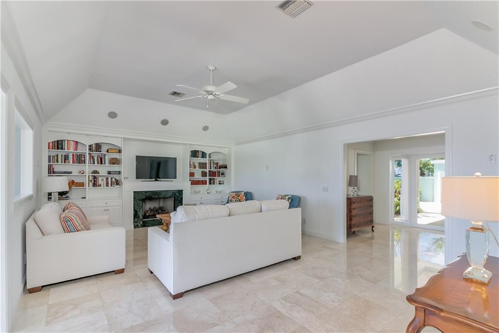 12 Heron's Nest Stuart, FL 34996 - Photo 22 of 43 a living room with furniture and a flat screen tv