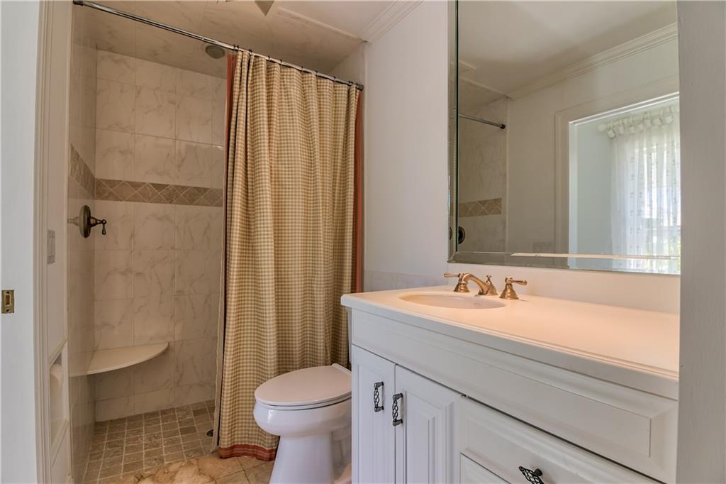 12 Heron's Nest Stuart, FL 34996 - Photo 30 of 43 a bathroom with a sink toilet and shower