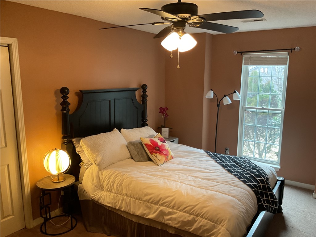 229 Cub Cove Drive Walhalla, SC 29691 - Photo 38 of 50 This cozy bedroom features a window offering natural light and a comforting atmosphere.