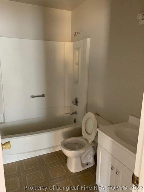 3331 Arrowhead Road Spring Lake, NC 28390 - Photo 3 of 15 a bathroom with a toilet and a shower