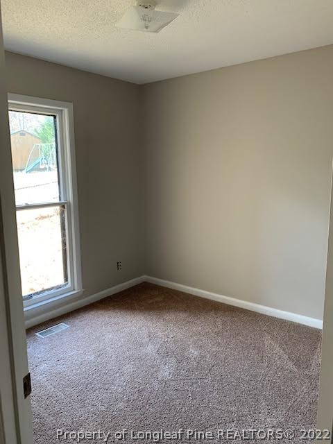 3331 Arrowhead Road Spring Lake, NC 28390 - Photo 5 of 15 an empty room with a window