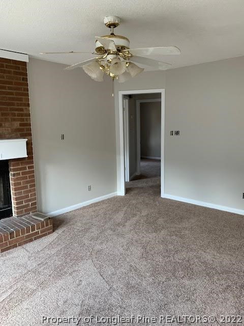 3331 Arrowhead Road Spring Lake, NC 28390 - Photo 7 of 15 a view of a hallway with a chandelier