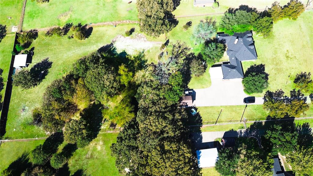 1246 Meadow Way Terrell, TX 75160 - Photo 36 of 39 an aerial view of a house with a yard