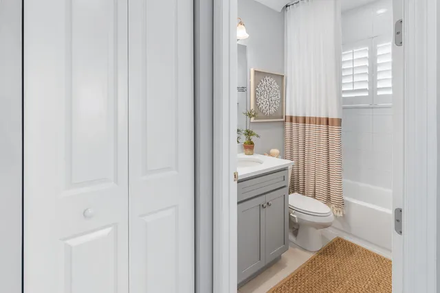 a kitchen with stainless steel appliances granite countertop a refrigerator and a stove