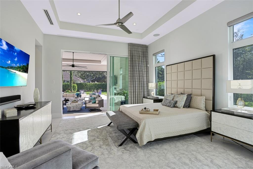 600 Gordonia Road Naples, FL 34108 - Photo 14 of 35 Master bedroom with access to outdoor area.