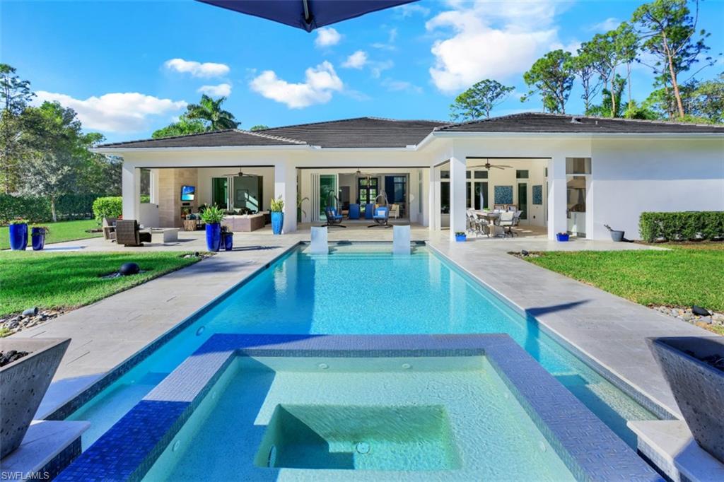 600 Gordonia Road Naples, FL 34108 - Photo 2 of 35 Pool with spa and fabulous outdoor area on 1.65 acre lot