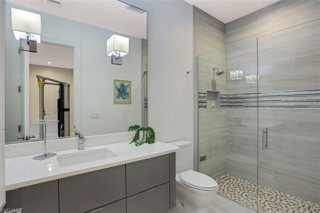 600 Gordonia Road Naples, FL 34108 - Photo 21 of 35 Guest bathroom with shower