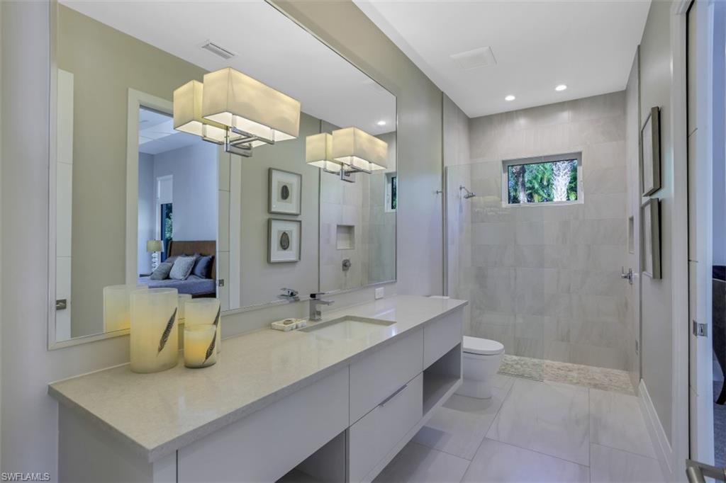 600 Gordonia Road Naples, FL 34108 - Photo 23 of 35 En suite bathroom.