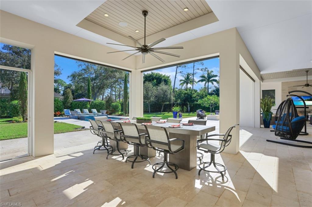 600 Gordonia Road Naples, FL 34108 - Photo 28 of 35 Fabulous outdoor area with roll down screens.