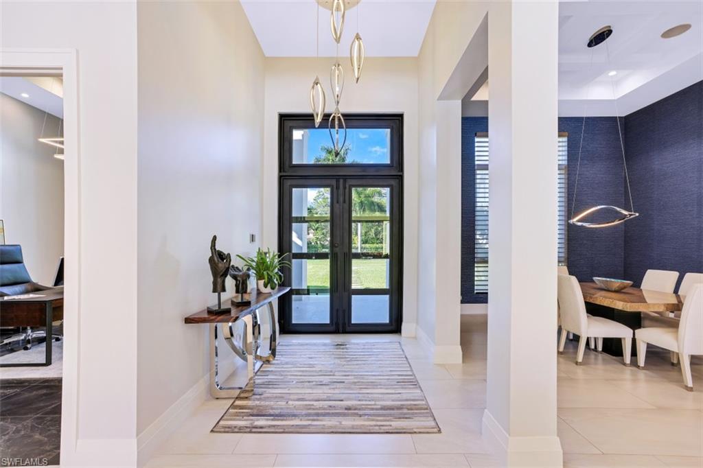 600 Gordonia Road Naples, FL 34108 - Photo 5 of 35 Foyer with custom front door