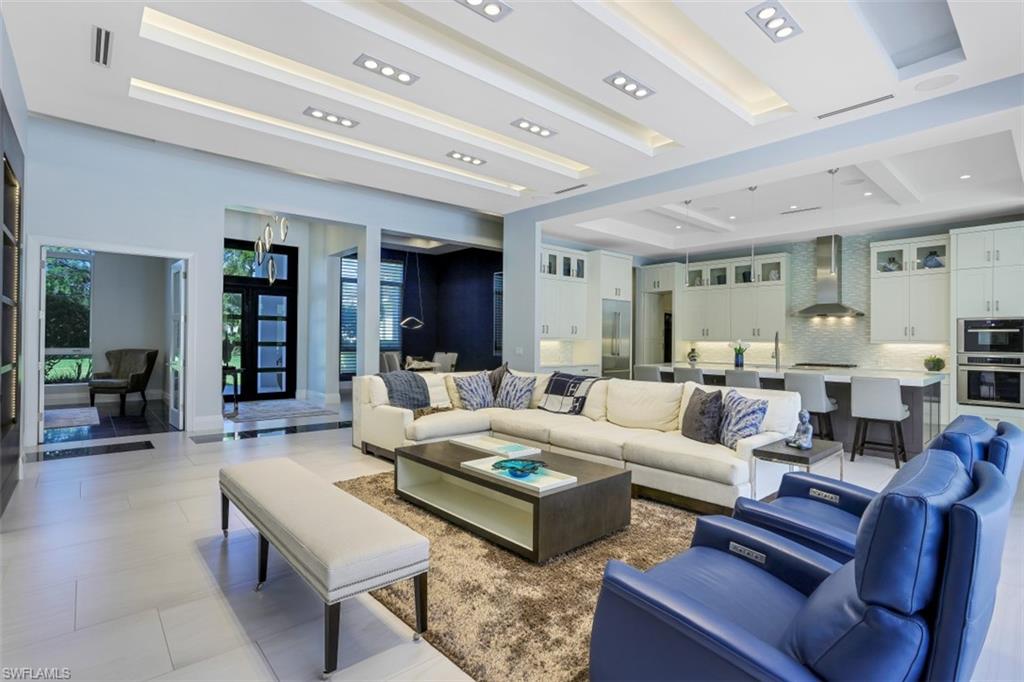 600 Gordonia Road Naples, FL 34108 - Photo 6 of 35 Great room with custom light and gourmet kitchen