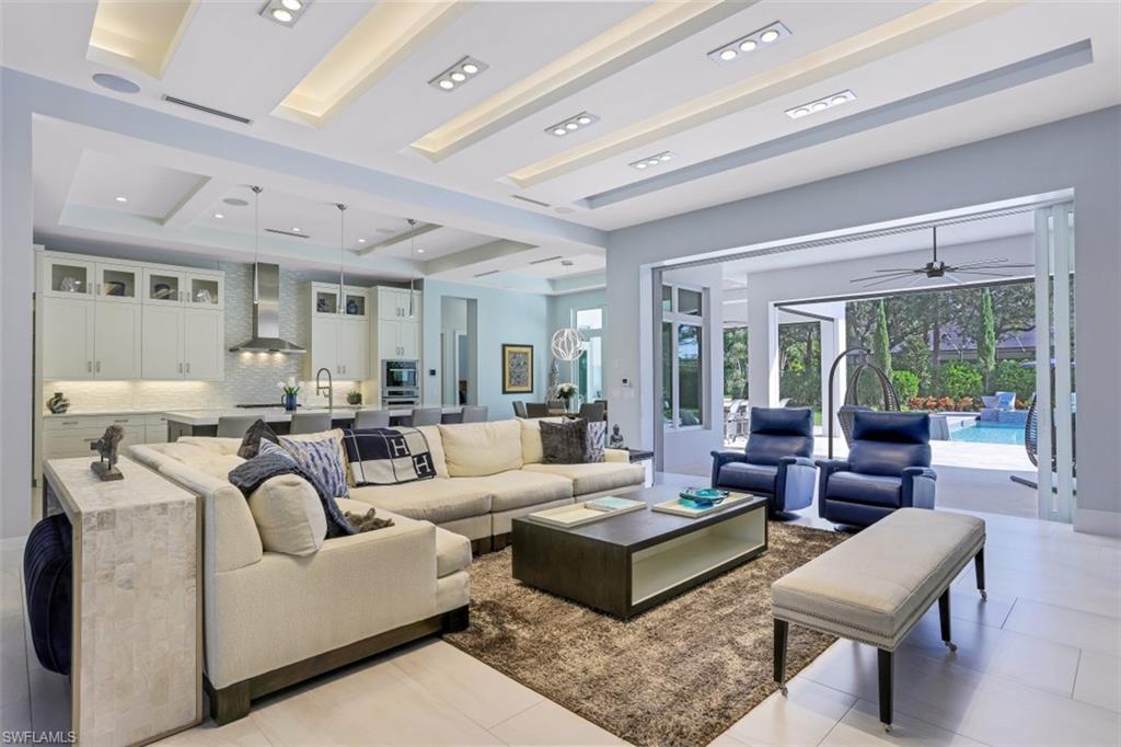 600 Gordonia Road Naples, FL 34108 - Photo 8 of 35 Great room with slider access to the outdoor area.