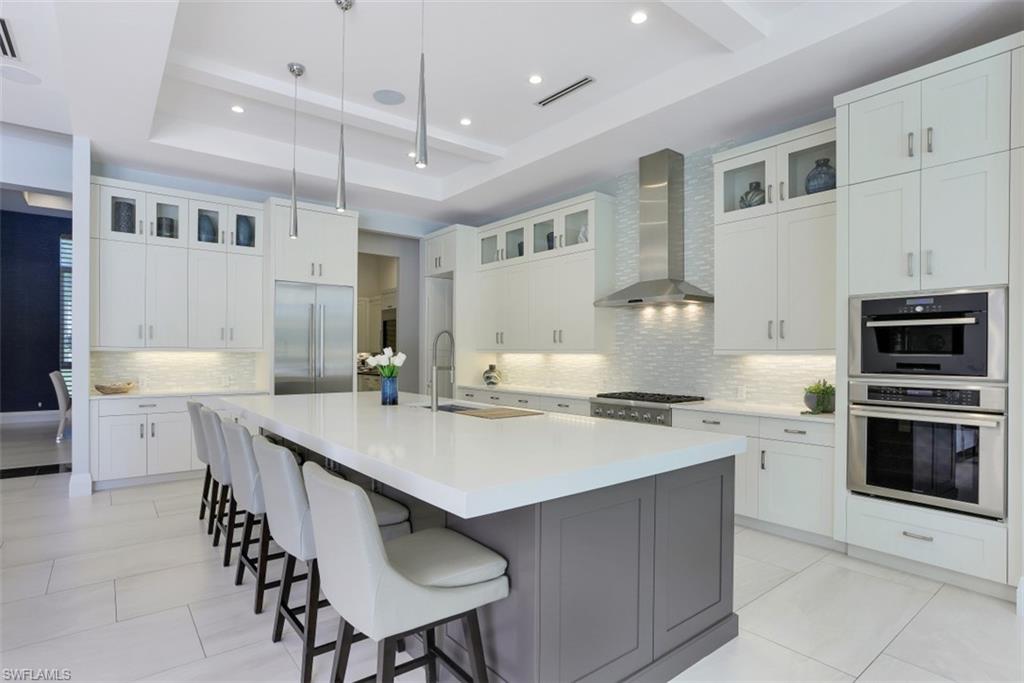 600 Gordonia Road Naples, FL 34108 - Photo 10 of 35 Large center island in gourmet kitchen