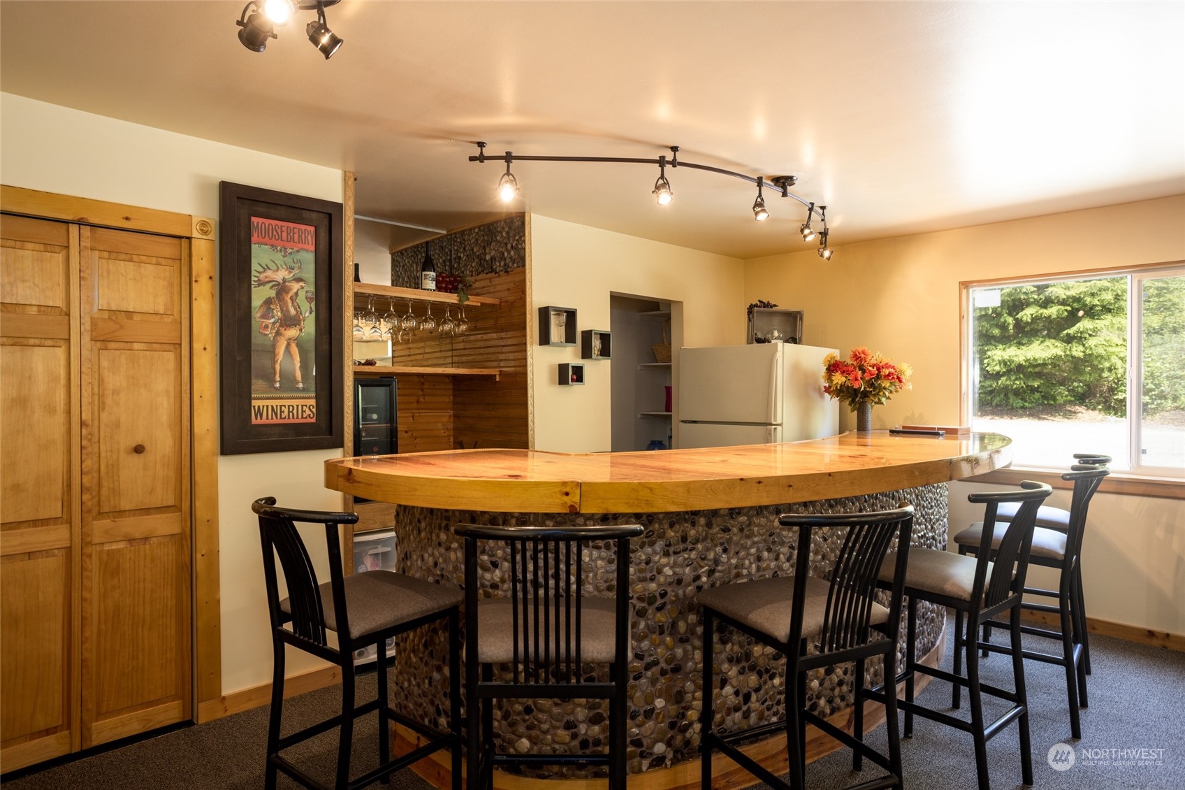 23627 Hoogdal Road Sedro-Woolley, WA 98284 - Photo 11 of 39 a dining table with chairs and window
