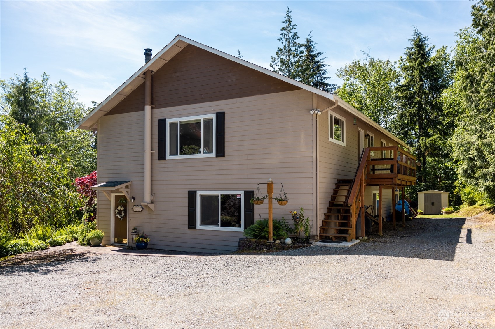 23627 Hoogdal Road Sedro-Woolley, WA 98284 - Photo 31 of 39 a front view of a house with a yard and garage