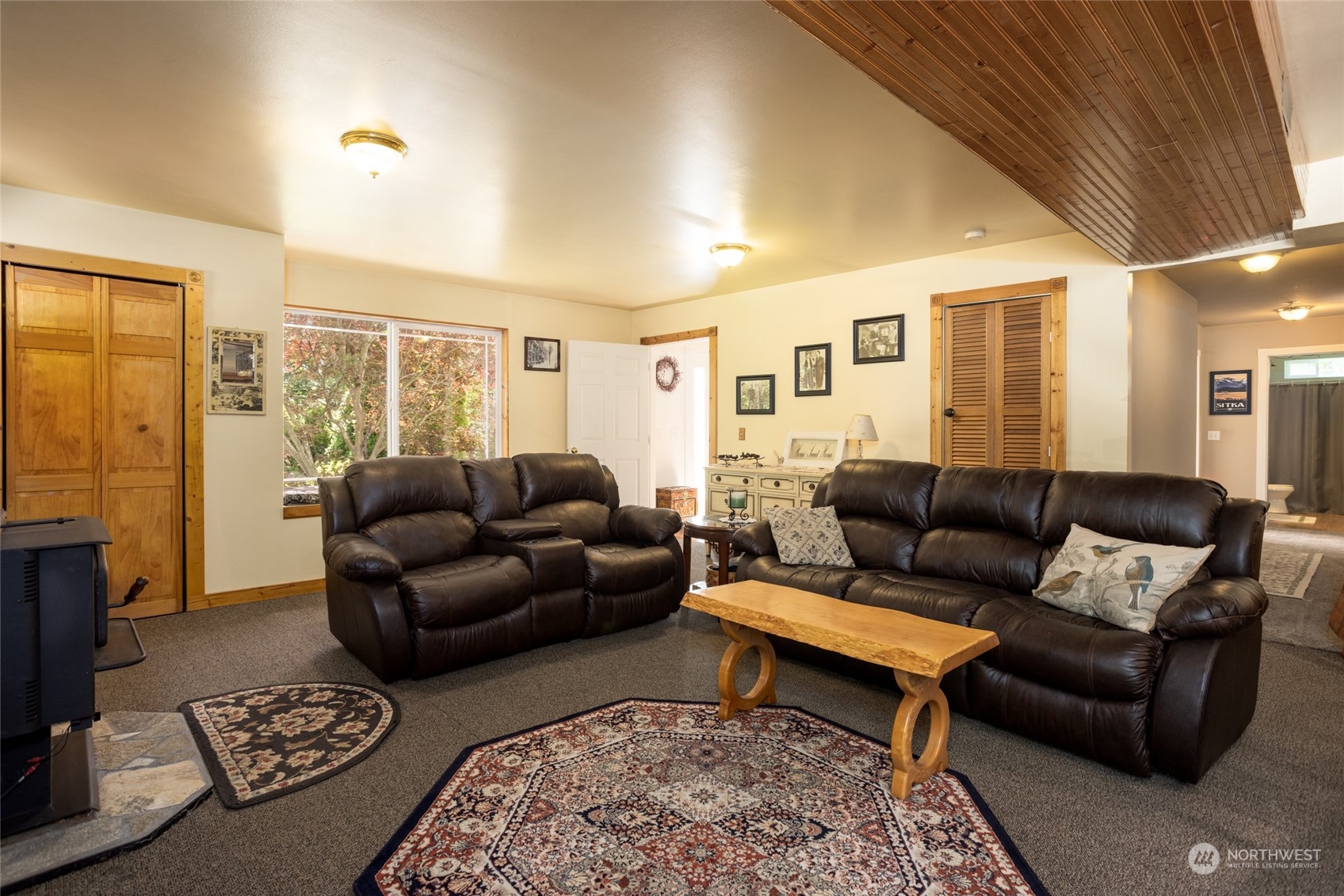 23627 Hoogdal Road Sedro-Woolley, WA 98284 - Photo 10 of 39 a living room with furniture and a rug
