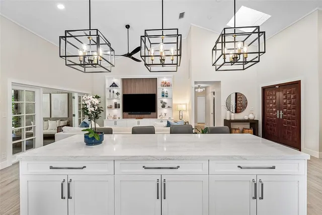 a view of a storage and utility room with washer and dryer