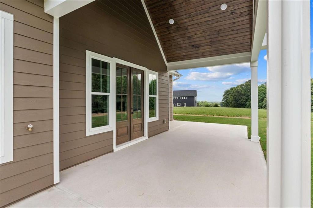 591 Welcome Road Roopville, GA 30170 - Photo 47 of 60 a view of a porch