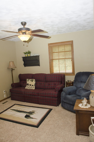 1701 Ridgewood Drive Morrison, IL 61270 - Photo 6 of 19 a living room with furniture and a window
