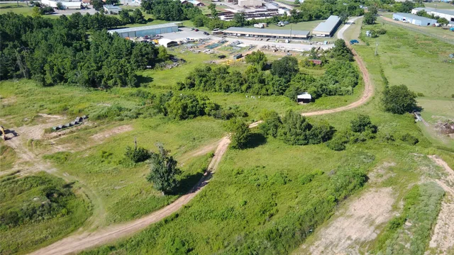 a view of a lake with a yard