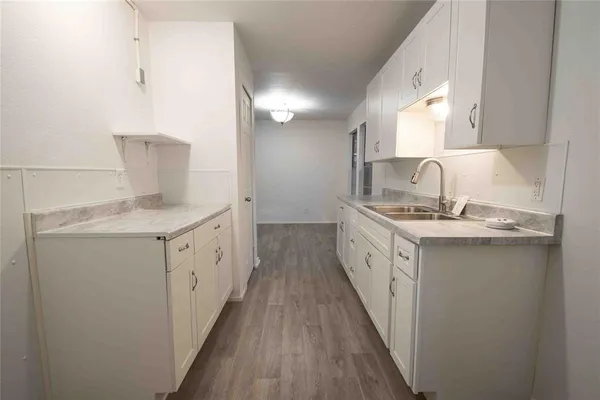 a bathroom with sink and mirror