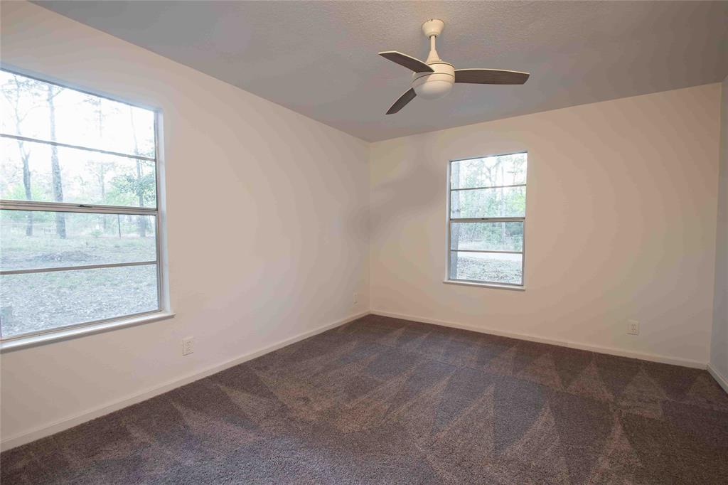 840 Oak Meadow Drive Murchison, TX 75778 - Photo 17 of 27 an empty room with a window
