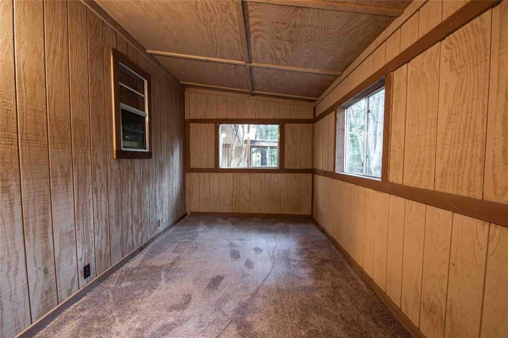 840 Oak Meadow Drive Murchison, TX 75778 - Photo 19 of 27 a view of an empty room with a window