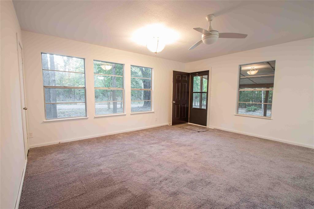 840 Oak Meadow Drive Murchison, TX 75778 - Photo 9 of 27 an empty room with windows and closet