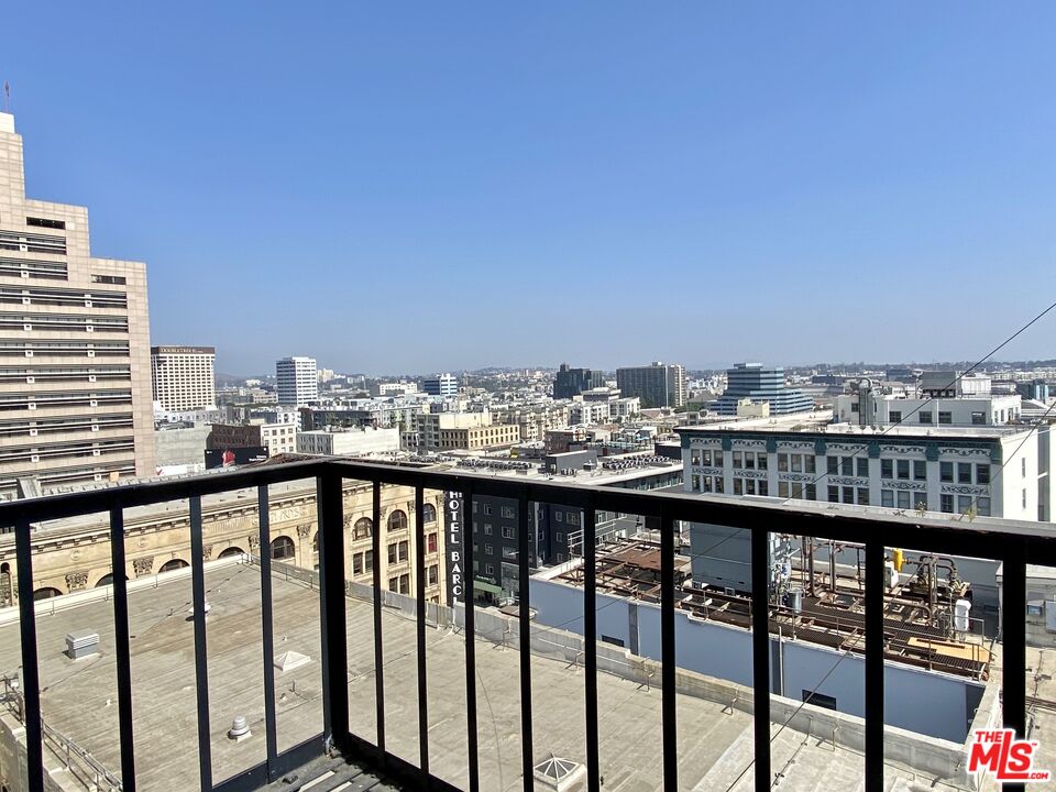 416 South Spring Street, Unit 1210 Los Angeles, CA 90013 - Photo 2 of 15 a view of city from a balcony