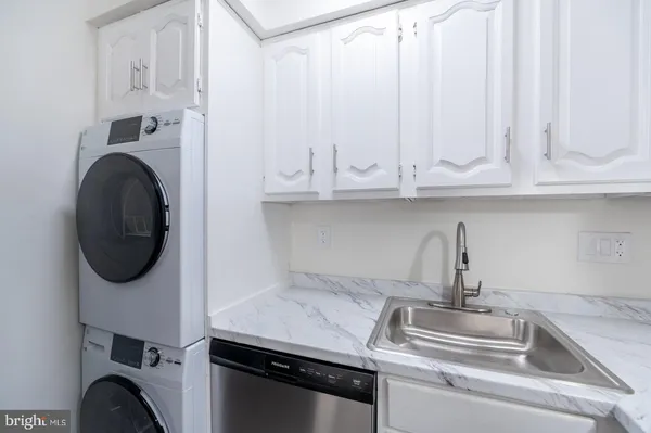 a kitchen with a stove and a microwave
