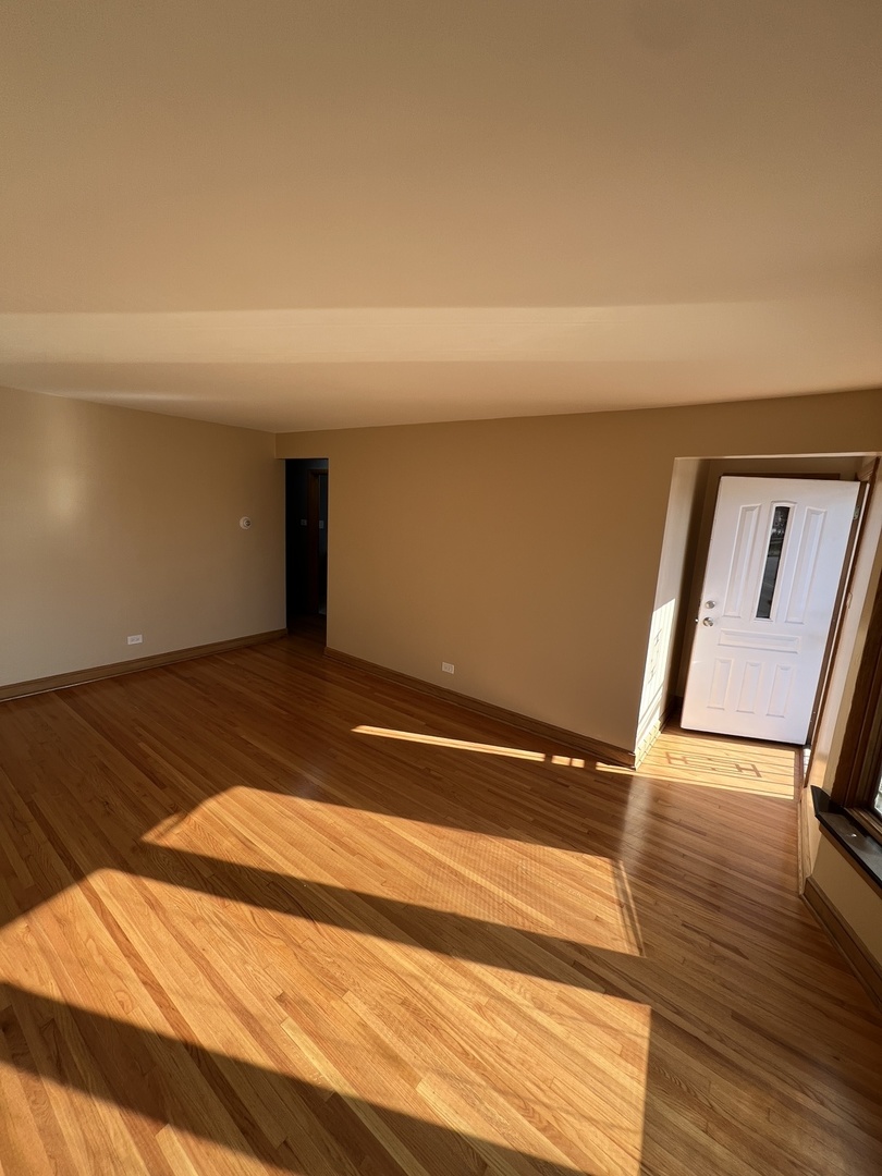 4148 West 87th Street Chicago, IL 60652 - Photo 4 of 16 a view of wooden floor