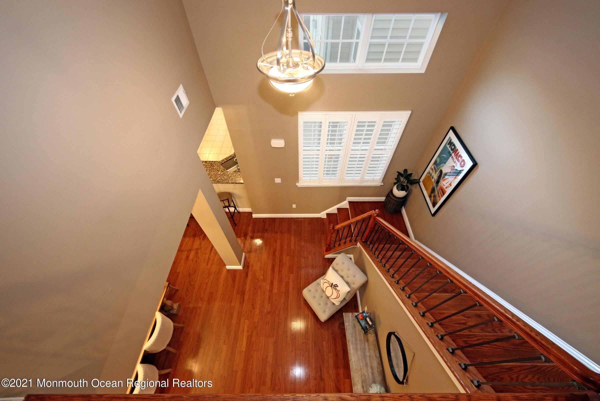 502 Abby Road Middletown, NJ 07748 - Photo 16 of 24 a view of entryway with wooden floor