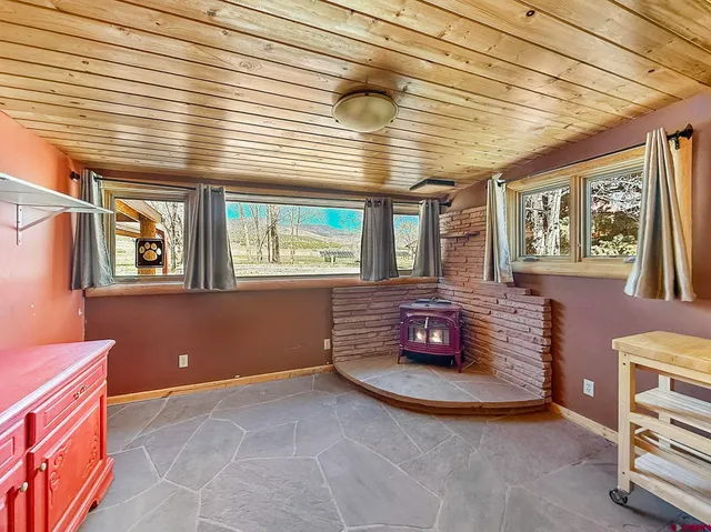 a view of livingroom with furniture and windows